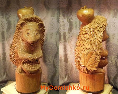 Фото деревянной скульптуры ежика с яблоком Фото деревянной скульптуры ежика с яблоком